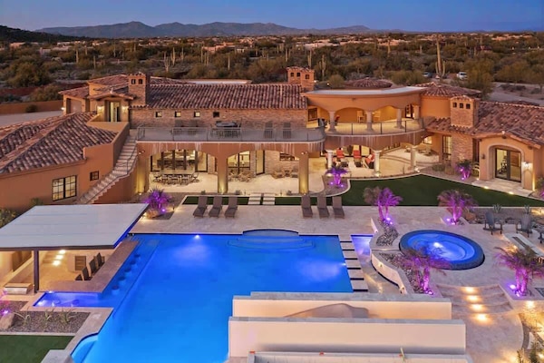 Your private 40-acre retreat glows as evening descends on the desert
