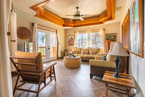 Signature Villa | Living area | 40-inch LED TV with cable channels, TV, DVD player - Lighthouse Beach Villas (San Pedro)