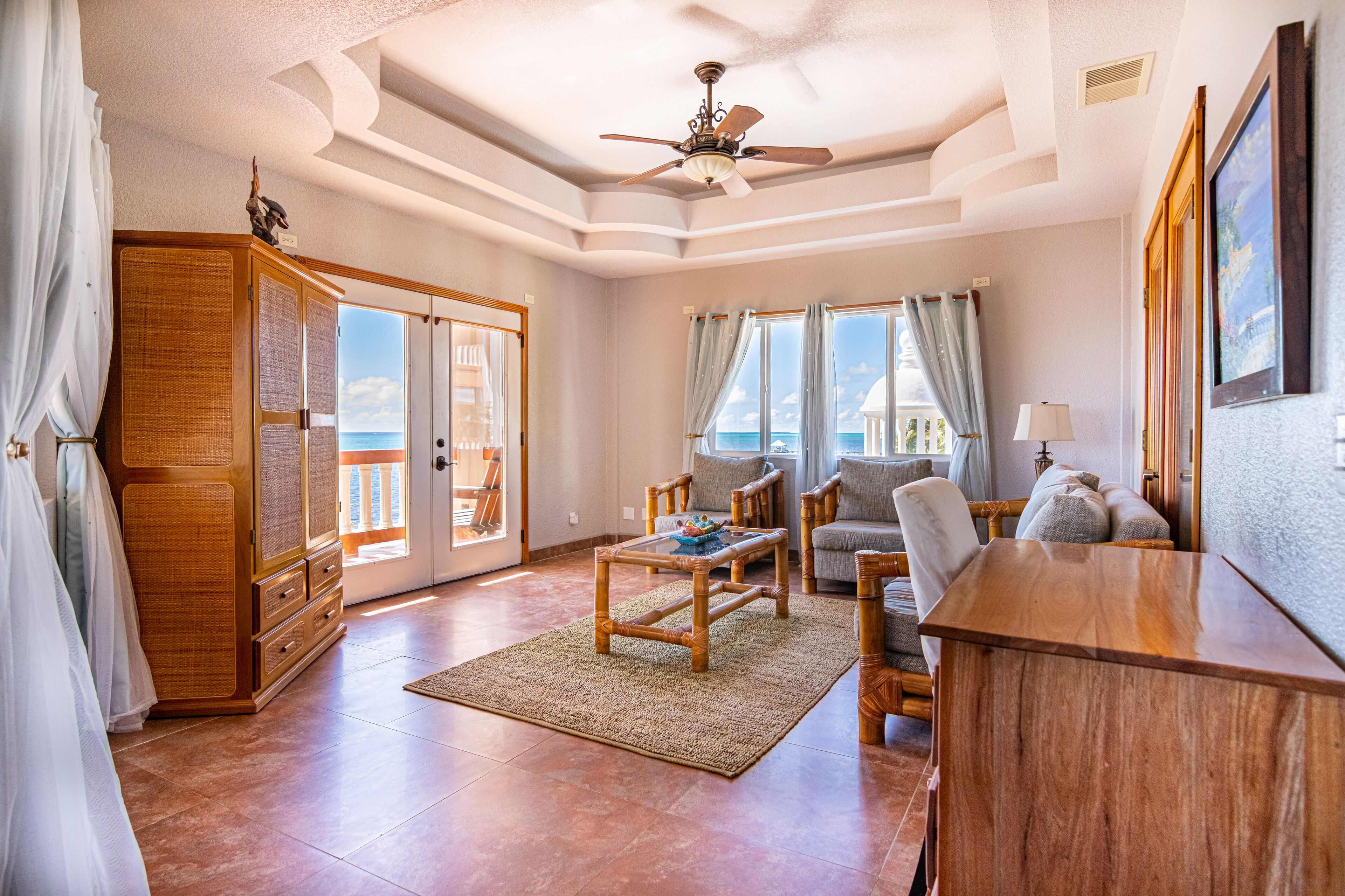 Superior Villa | Living area | 40-inch LED TV with cable channels, TV, DVD player