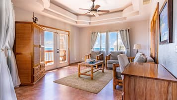 Superior Villa | Living area | 40-inch LED TV with cable channels, TV, DVD player