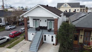 Stunning two-story home with a charming front porch and inviting entrance.