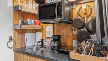 Fridge, microwave, coffee/tea maker, toaster