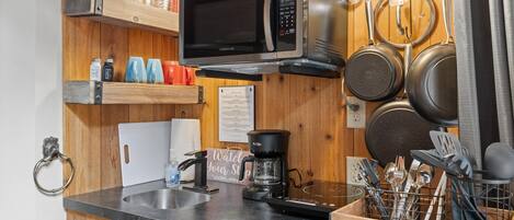 Fridge, microwave, coffee/tea maker, toaster