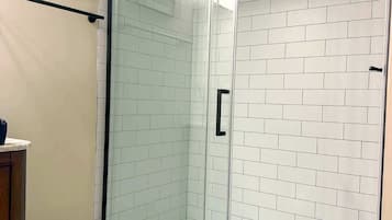 Hair dryer, towels, shampoo, toilet paper