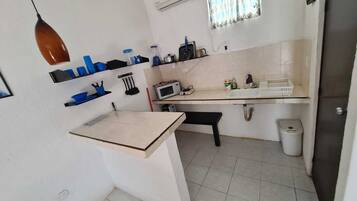 Fridge, microwave, cookware/dishes/utensils, spices