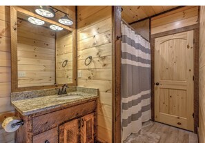 Combined shower/tub, hair dryer, towels, soap