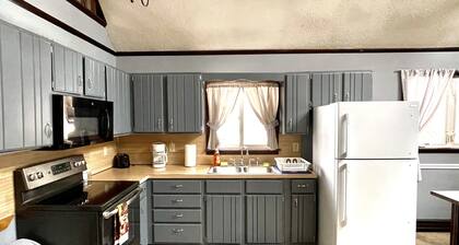 Entire Cozy Pocono Chalet with fireplace, Firepit BBQ and games