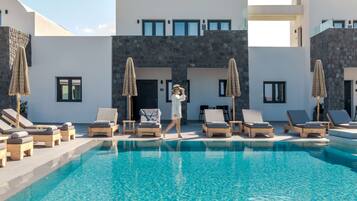 Outdoor pool, open 9:00 AM to 8:00 PM, sun loungers