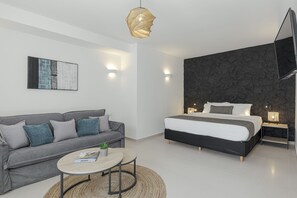 Economy kamer | Een minibar, een kluis op de kamer, een bureau, een laptopwerkplek