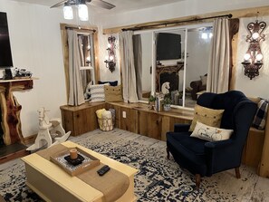 Smart TV, fireplace, books