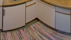 A compact kitchen with a microwave, toaster, and coffee maker. - Vacation apartment 4 for 2 persons, 1 bedroom, upper floor, balcony, 53 m² (Inzell)