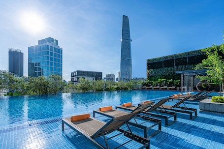 Outdoor pool, open 7:00 AM to 8:00 PM, pool umbrellas, sun loungers