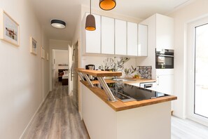 Refrigerador, microondas, horno y lavavajillas 