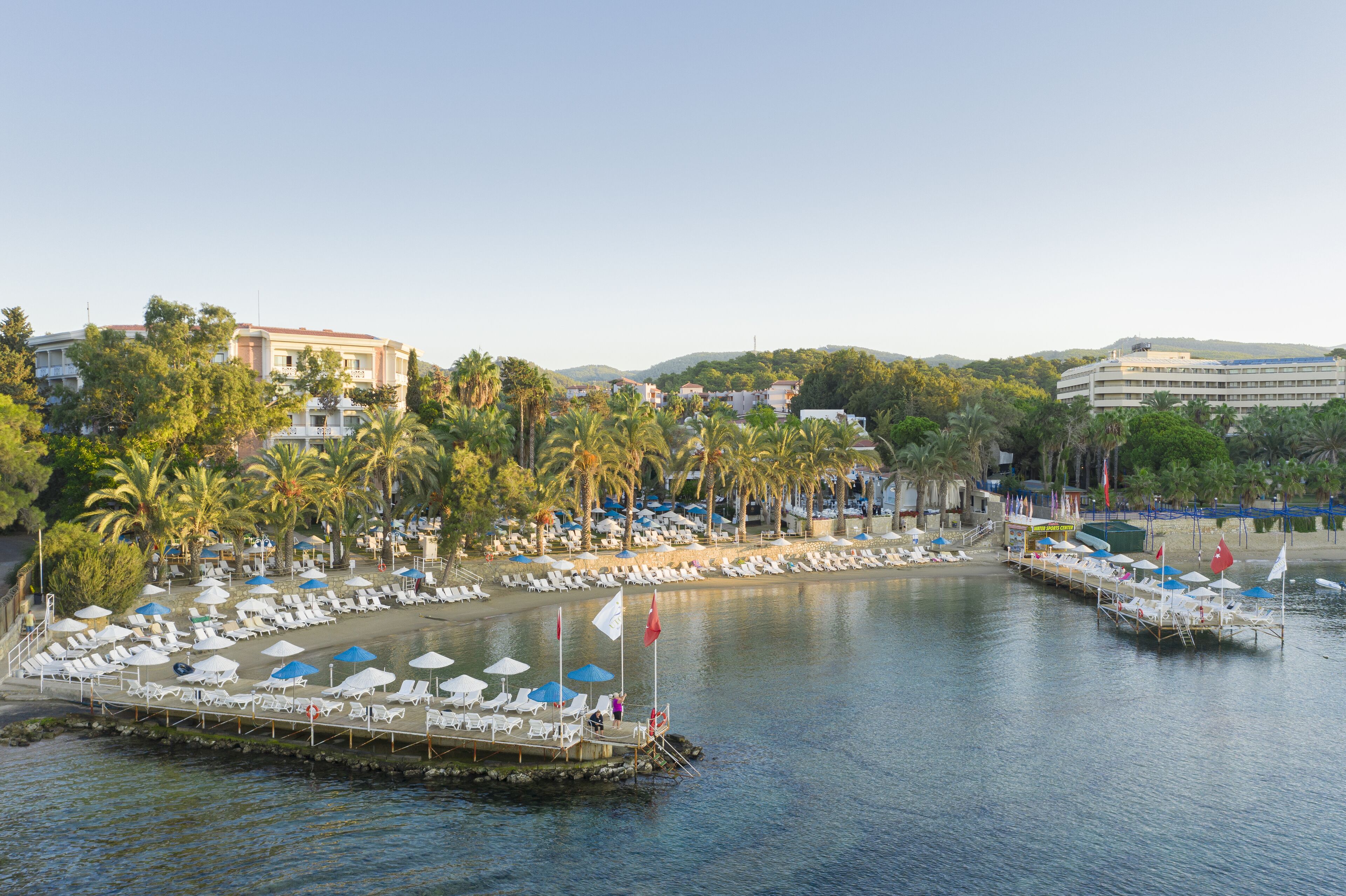 Private beach, free beach shuttle, sun loungers, beach umbrellas