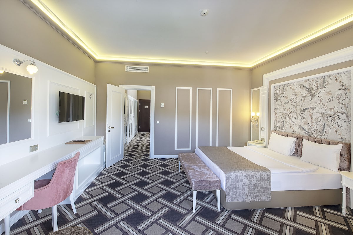 Familiesuite | 2 soveværelser, minibar, pengeskab på værelset, sengetøj