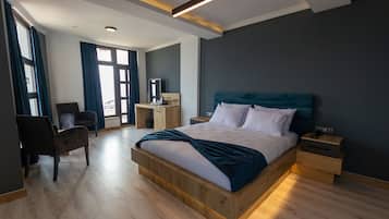 Premium bedding, memory-foam beds, minibar, desk