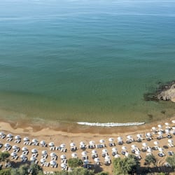 On the beach, sun-loungers, beach umbrellas, beach towels