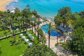 Indoor pool, seasonal outdoor pool, pool umbrellas, sun loungers