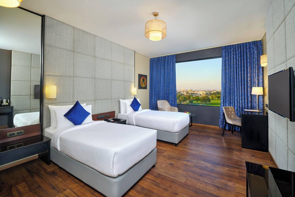 Deluxe Room, 2 Single Beds (DELUXE TWIN) | In-room safe, laptop workspace, soundproofing, iron/ironing board