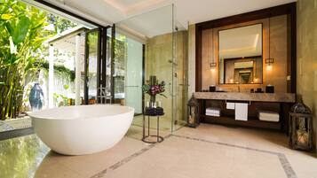 Separate bathtub and shower, rainfall showerhead, free toiletries