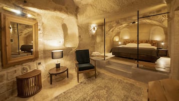 Suite Room | Minibar, in-room safe, soundproofing, iron/ironing board