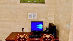 An Internet Area with a computer setup including a monitor, keyboard, and a desktop computer.
