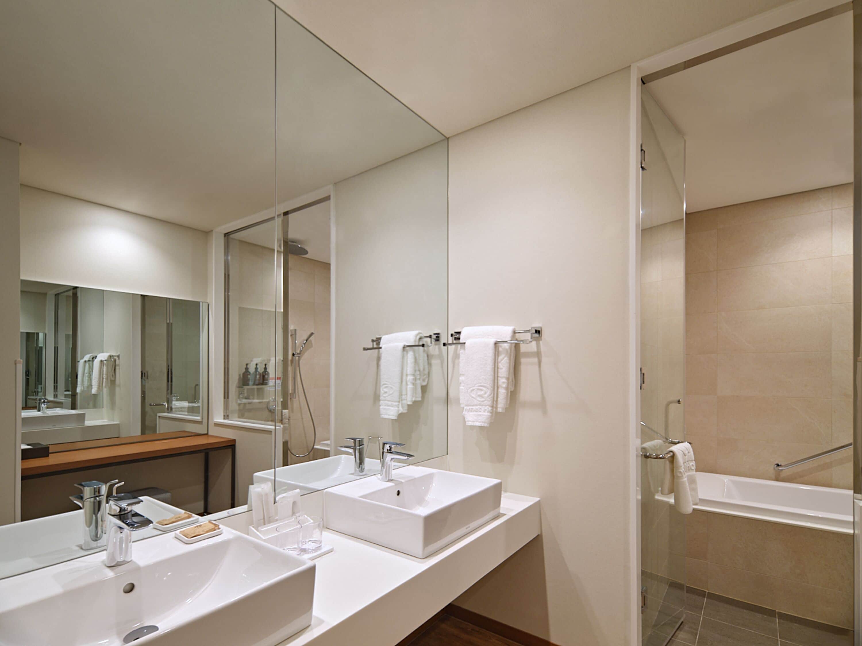 hair dryer, bathrobes, slippers, bidet