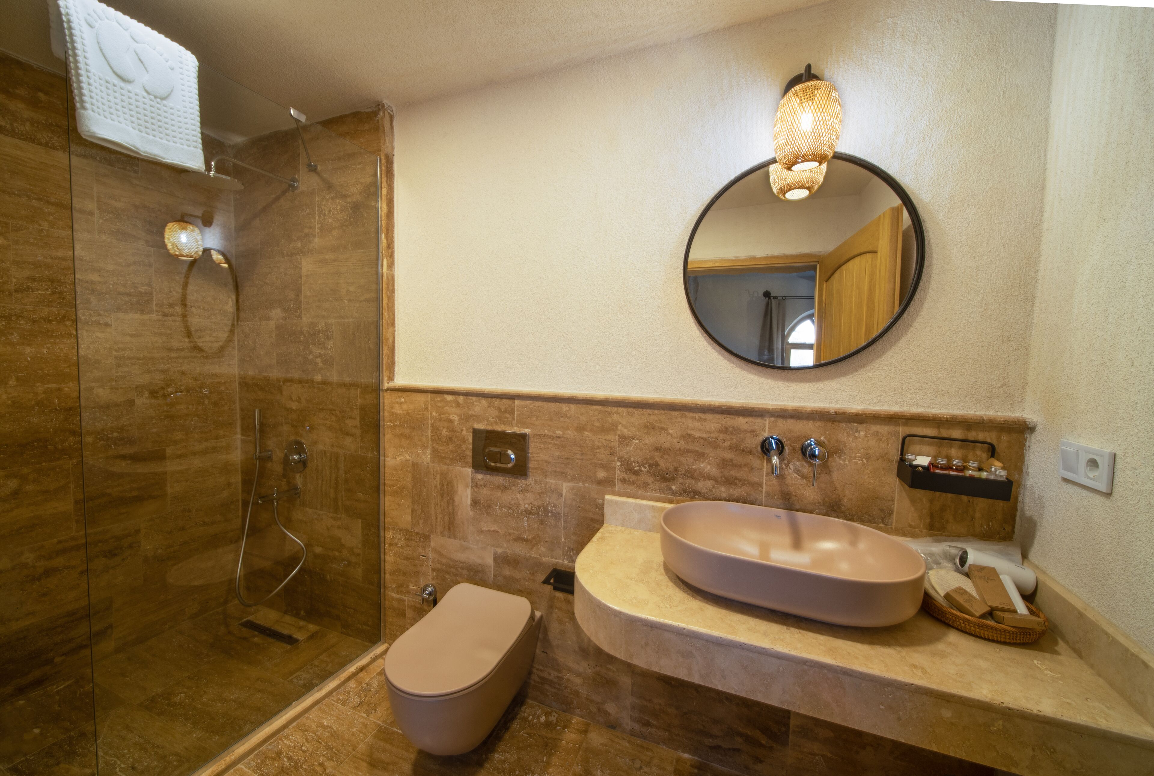 luxury room | bathroom | eco-friendly toiletries, hair dryer, slippers, towels