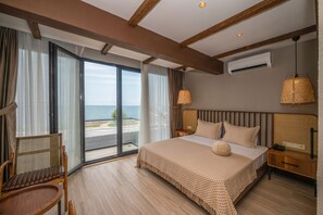 Habitación superior | Ropa de cama de alta calidad y minibar 