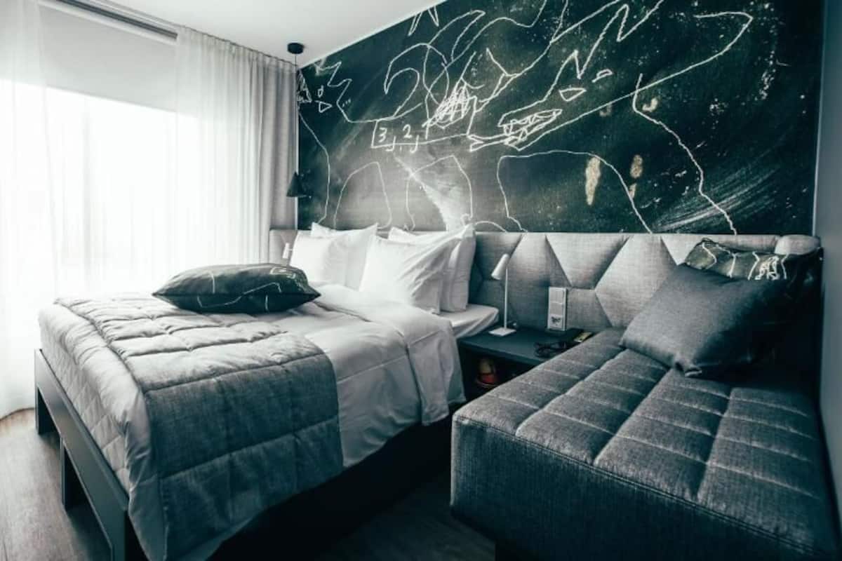 Down comforters, blackout drapes, WiFi (free), bed sheets