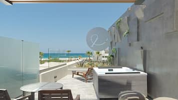 Executive Suite with Hot Tub & Sea View | Minibar, in-room safe, desk, soundproofing