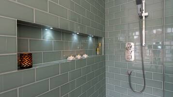 Bathtub, hair dryer, towels, soap