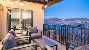 A balcony with a view of a mountainous landscape and a construction site. - Zion Village Poolhouse (From $299) Sleeps 24 * Spa (Hurricane)