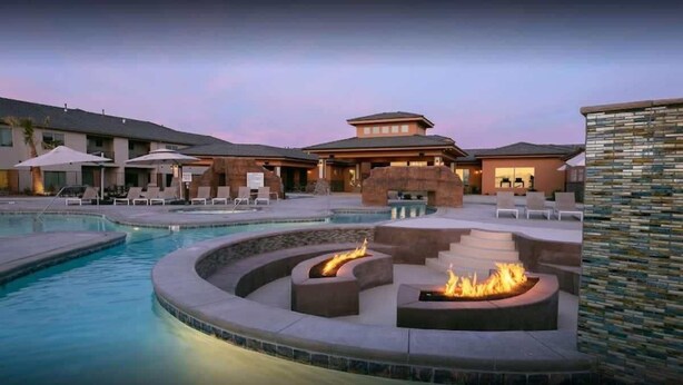 A pool area with lounge chairs and a fire pit. - Zion Village Poolhouse (From $299) Sleeps 24 * Spa (Hurricane)