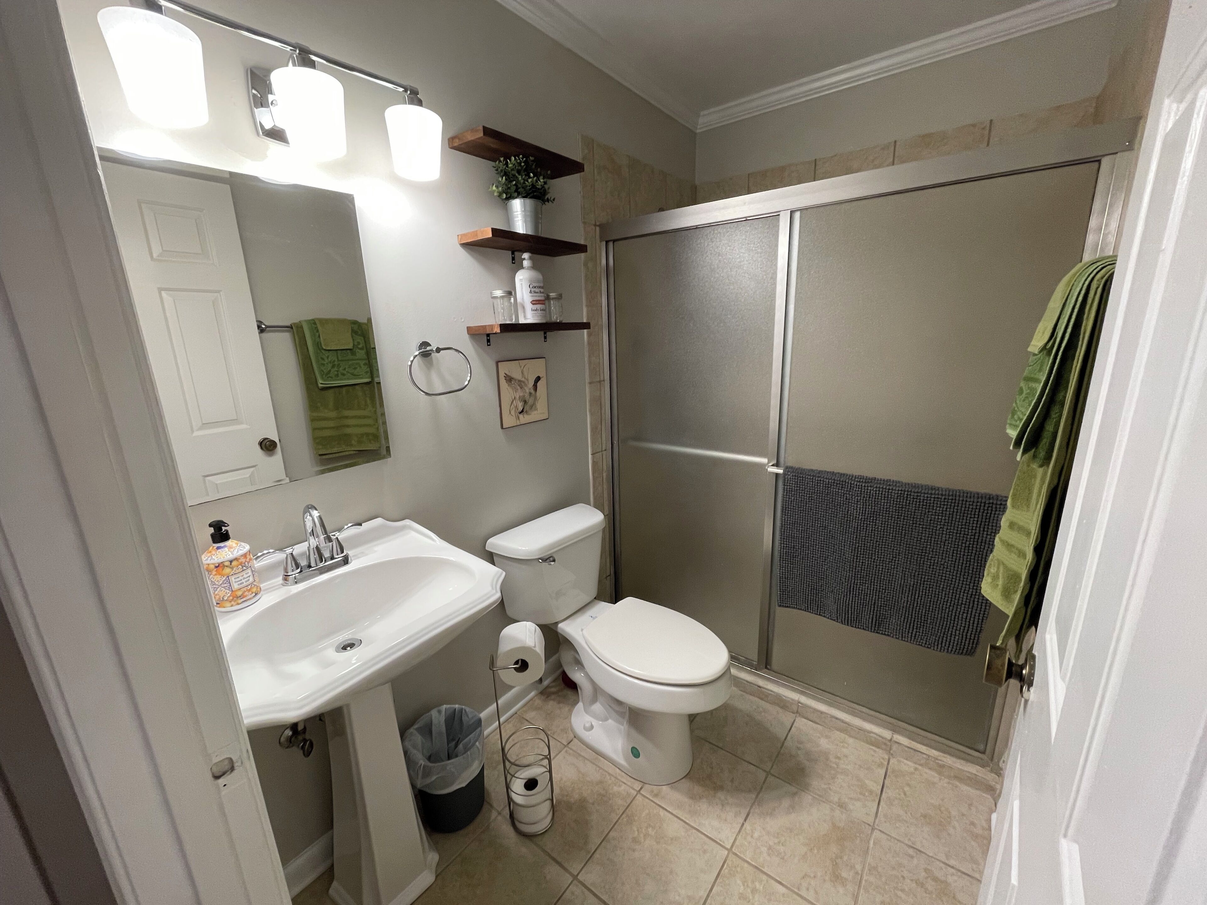 Shower, hair dryer, towels, shampoo