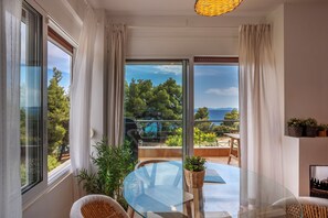 Alloggio Comfort su due livelli | Area soggiorno | TV 38 pollici con canali digitali