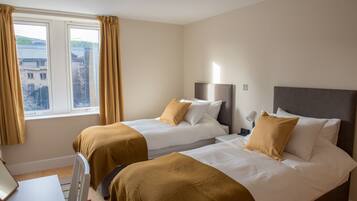 Apartamento urbano | 2 quartos, roupas de cama premium, individualmente decorados