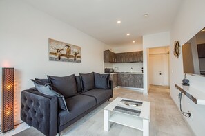 Signature Studio | Living area - Cozy Penthousestudio Cityview W12 (Bucharest)