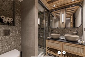 Combined shower/tub, hair dryer, towels, soap
