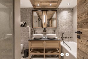 Combined shower/tub, hair dryer, towels, soap