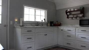 Fridge, microwave, coffee/tea maker, electric kettle