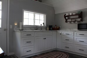 Fridge, microwave, coffee/tea maker, electric kettle