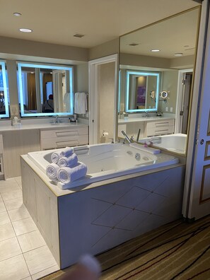 Shower, jetted tub, hair dryer, towels