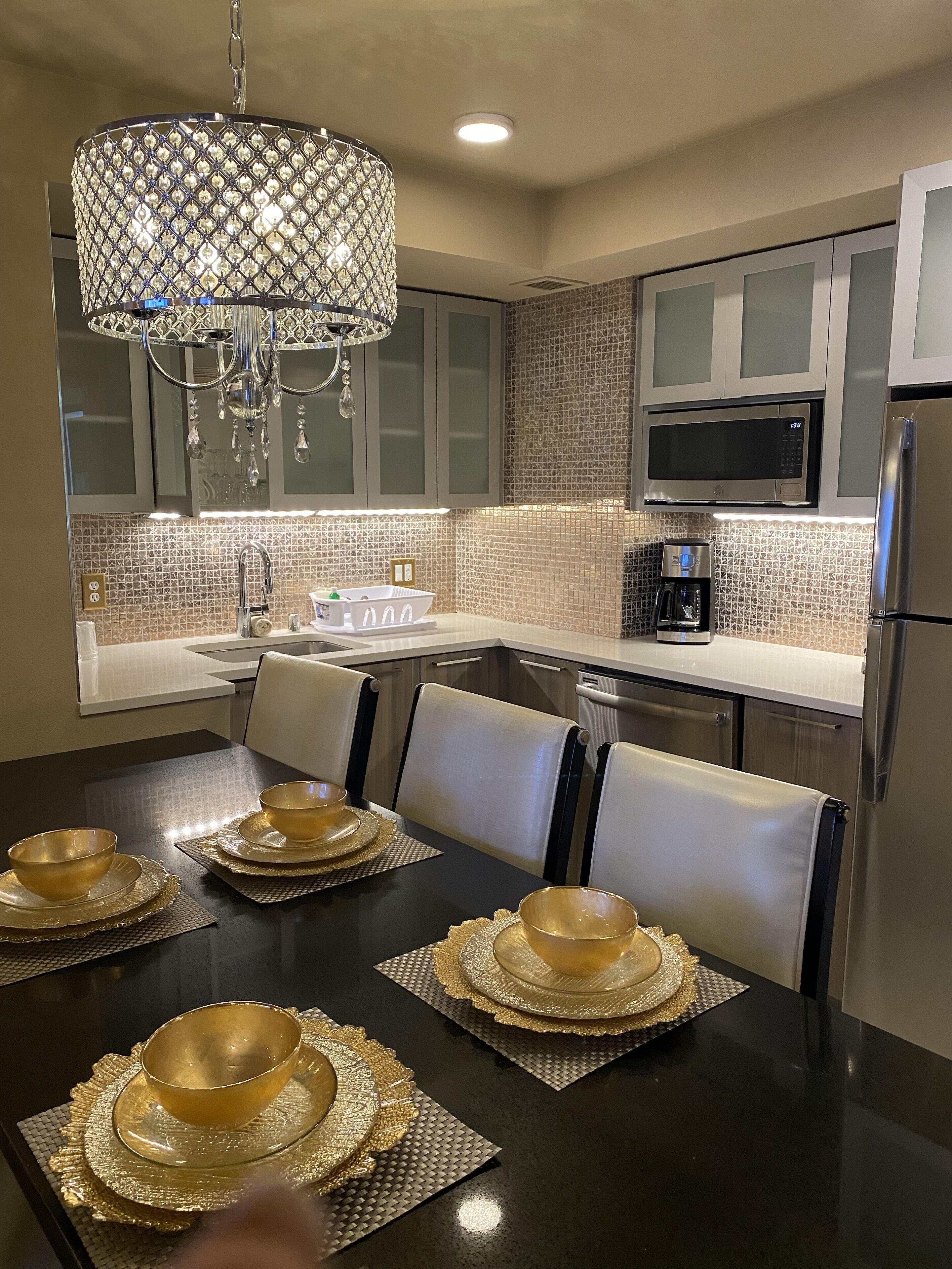 Fridge, microwave, coffee/tea maker, dining tables