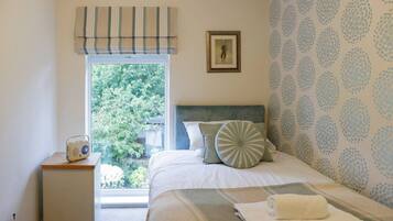 4 bedrooms, iron/ironing board, travel cot, WiFi