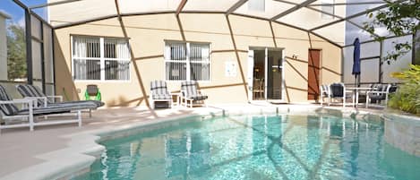 A heated pool, pool loungers
