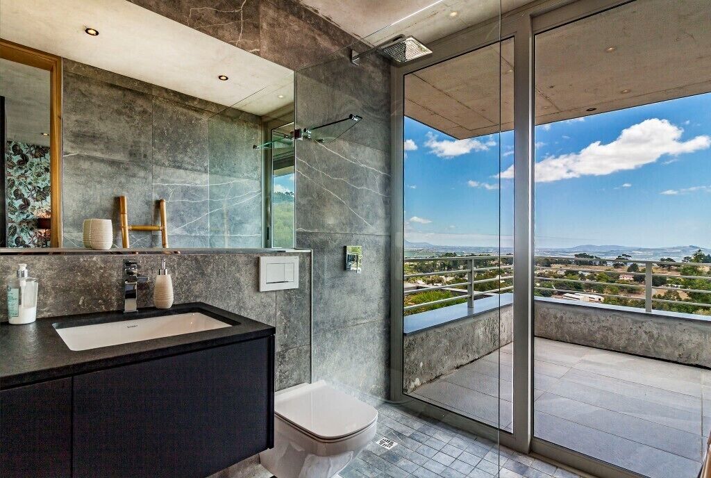 Shower, hair dryer, towels, toilet paper