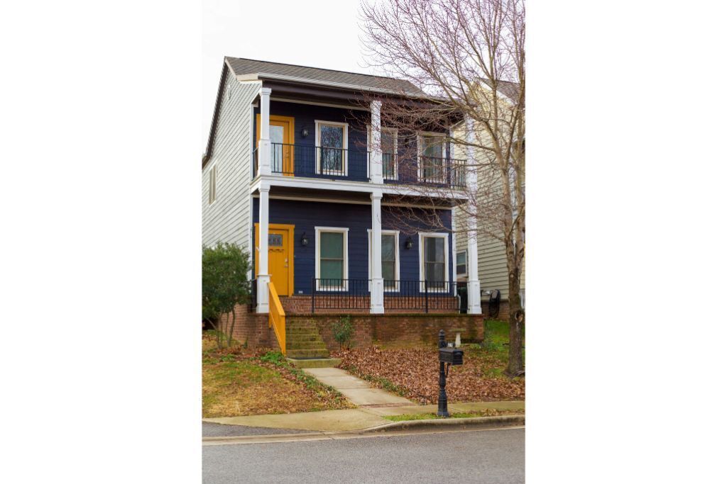 Cozy shotgun style house, centrally located in Northwest Arkansas.