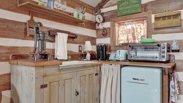 Microwave, coffee/tea maker, toaster, cookware/dishes/utensils