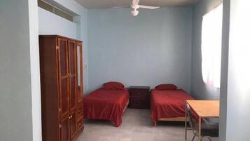 Economy Quadruple Room | Down comforters, iron/ironing board, free WiFi, bed sheets
